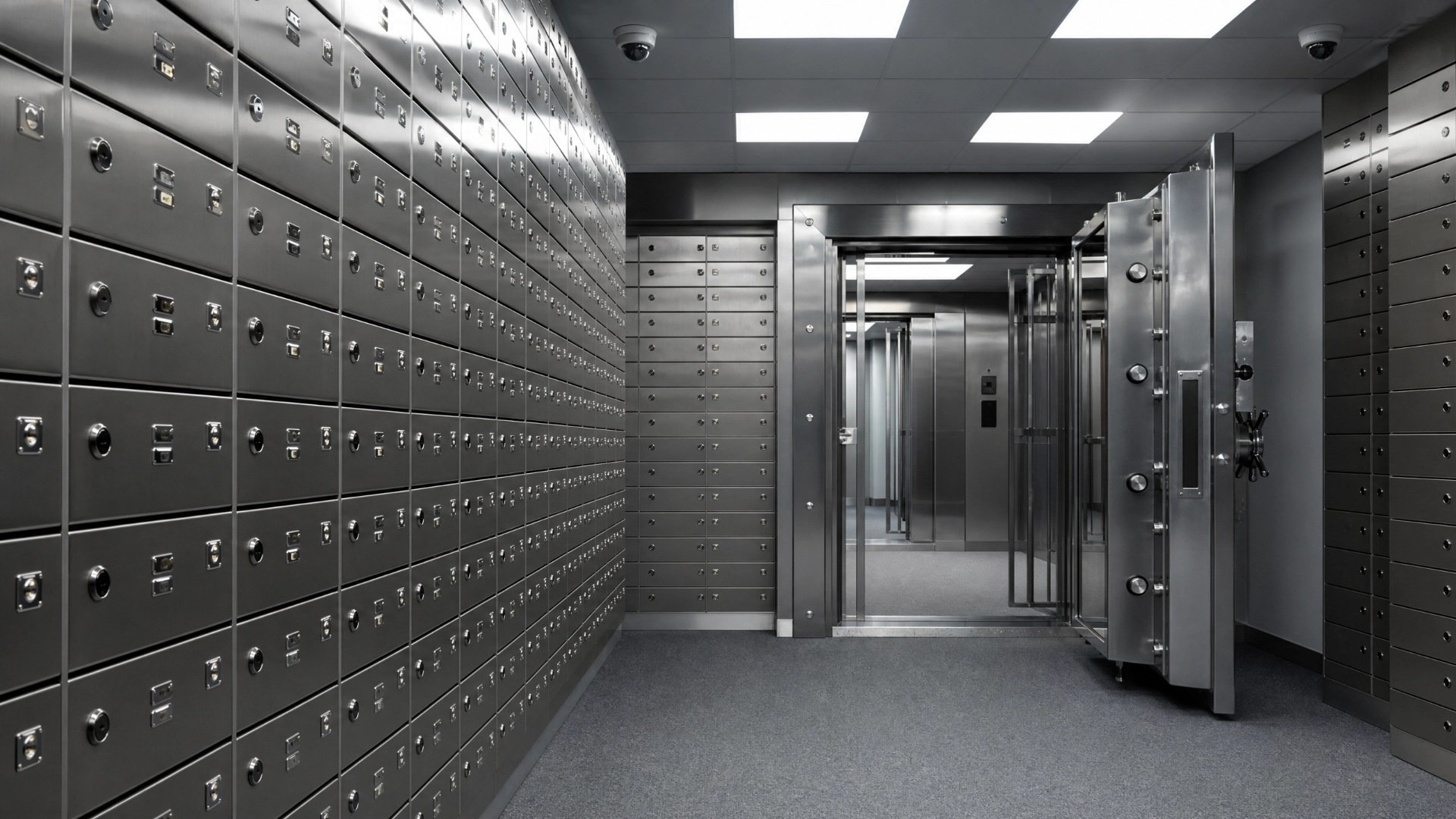 A spacious room filled with numerous metal lockers arranged neatly along the walls.